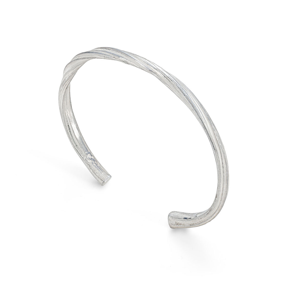 Delicately sculptural, Stirling silver cuff, the windswept moors captured using Mitsuro Hikime. By Emily Nixon.