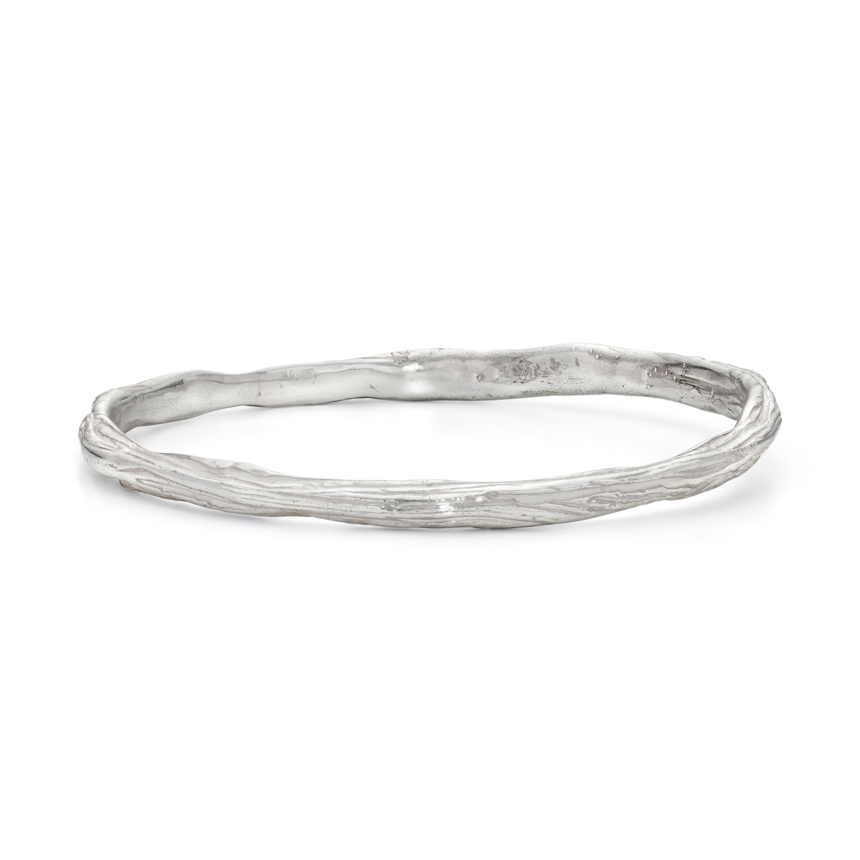 Silver bangle outlets - continuous ripples